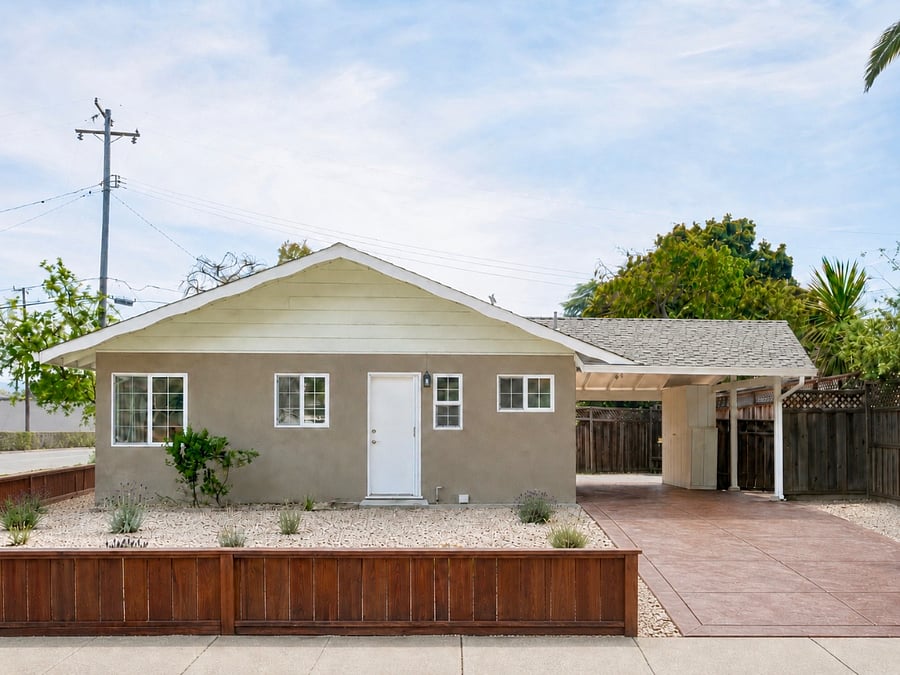 Handsome low fence
(note that the pictured car port and driveway are not part of the property listing. this space is frequently used for upgrading and yard maintenance)