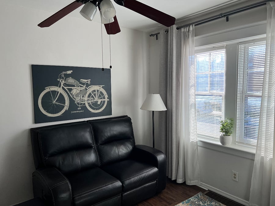 Super comfortable reclining love seat in living room!