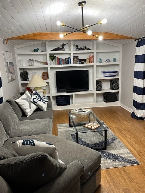 Cozy living area looks out onto patio deck.