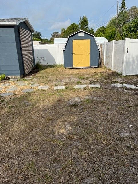 Plenty of room in yard for people and pets. Shed storage not available