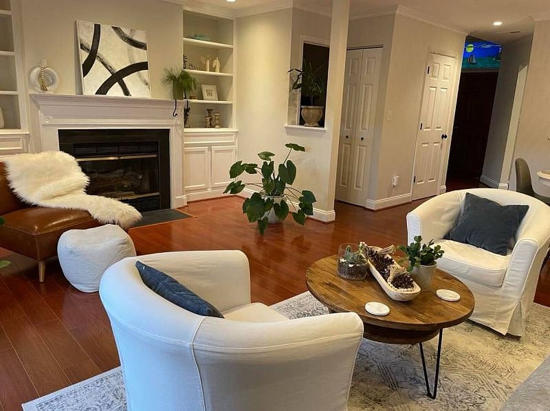 living room looking at fireplace.