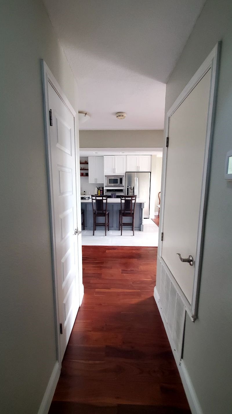 Views coming down the hardwood stairs