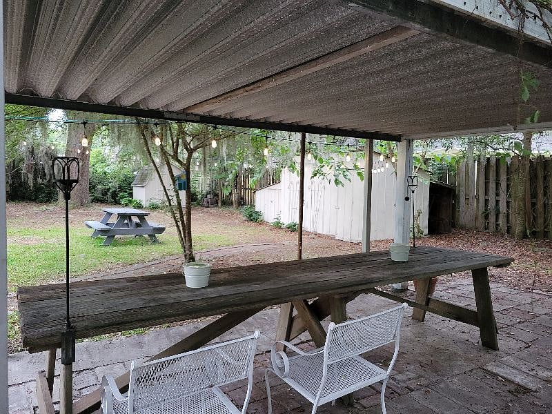 Covered picnic table and storage area