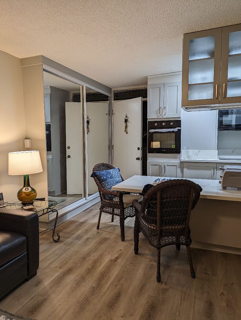 Large Pantry sliding mirrored doors on the left