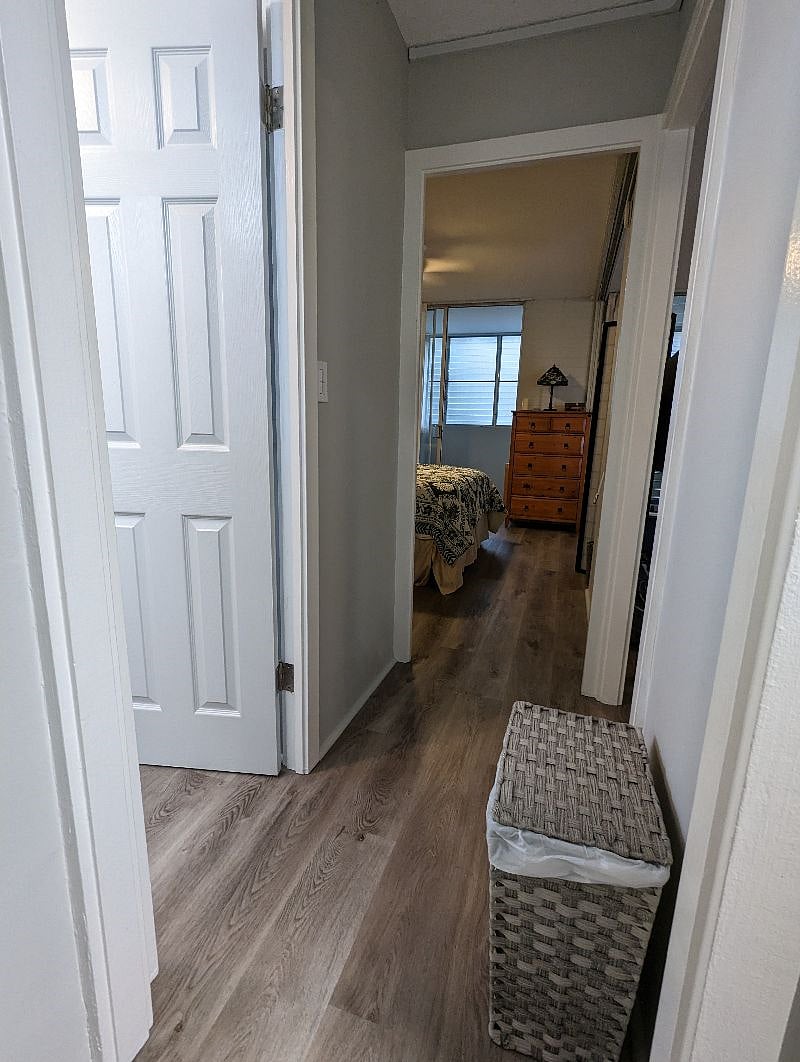leading to bedroom, bathroom to left