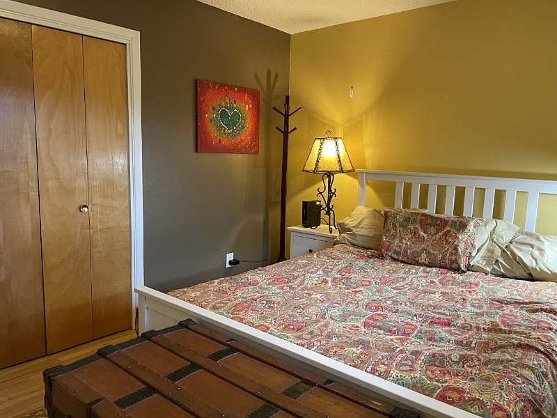 Secondary bedroom with full desk set up for work-from-home scenario.
