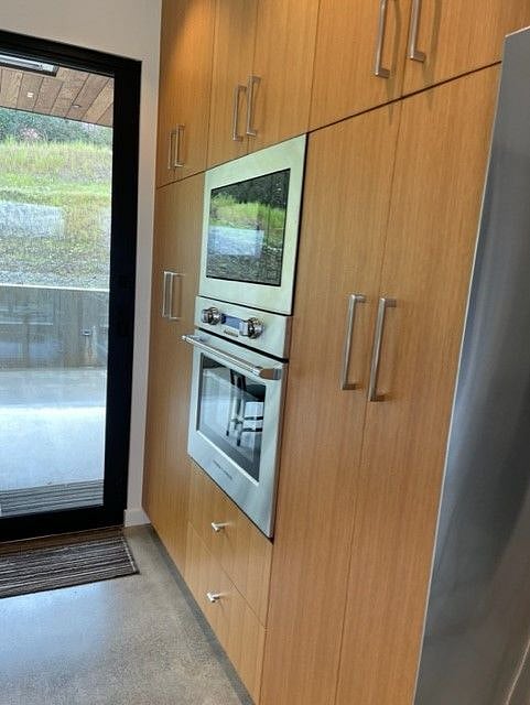 Full size microwave/ Fisher Paykel electric oven