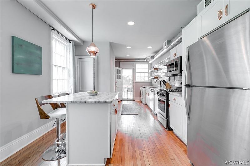 Comfortable Dining Area flowing into Kitchen