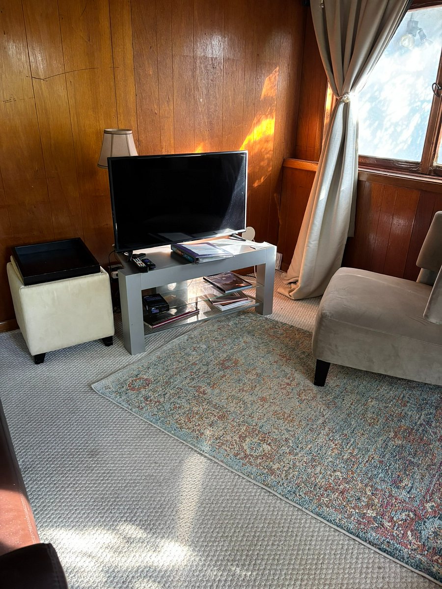 Bright living room with Roku streaming tv
