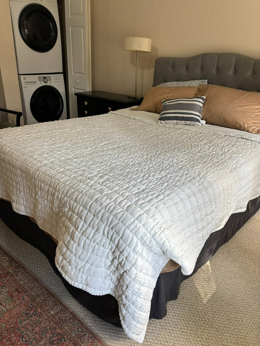Separate bedroom with queen bed