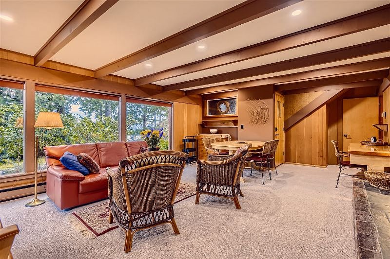 Enjoy the views from expansive windows, nature awaits.