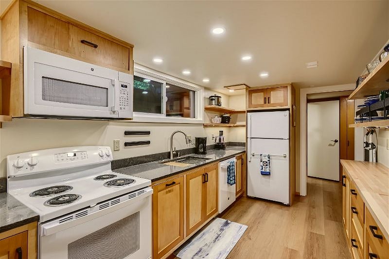 Updated kitchen, fully stocked with the latest appliances for easy and fast meals.