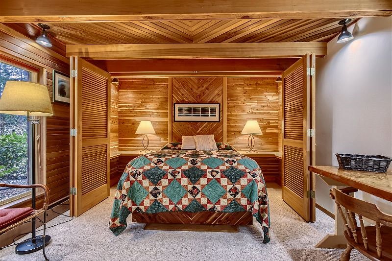 Main bedroom with custom queen size Murphy bed.