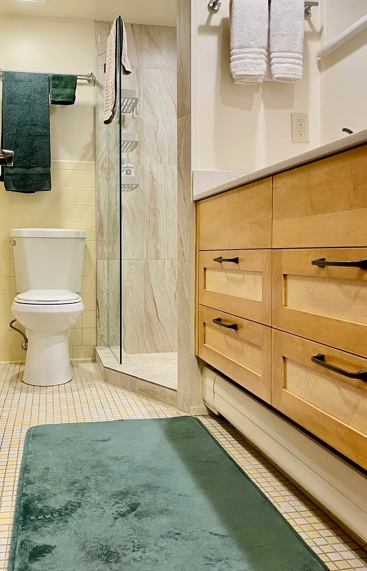 Newly remodeled bathroom with updated vanity and shower