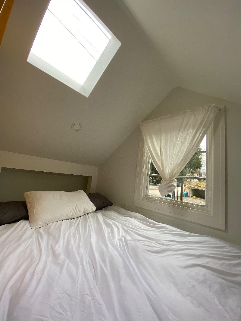 Sleeping loft with skylight and window