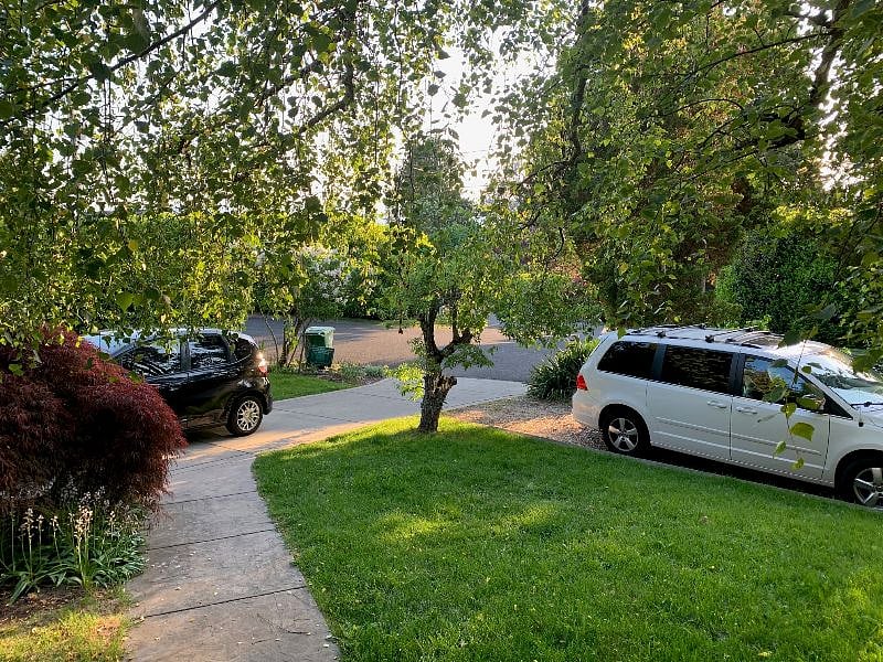 View from the entrance of the main house, front garden and street.