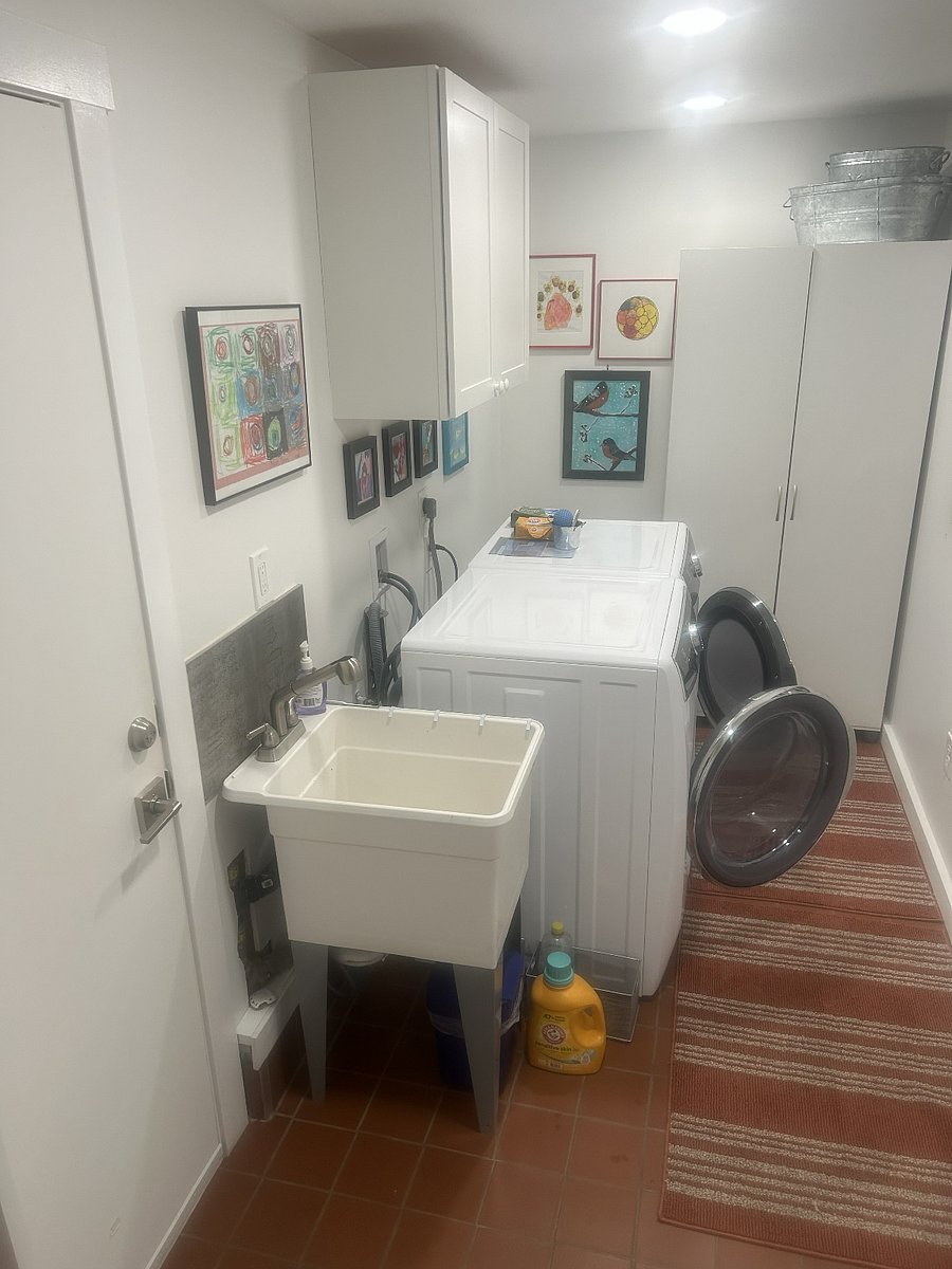 Shared Laundry area, adjacent to entrance area, lockable door.