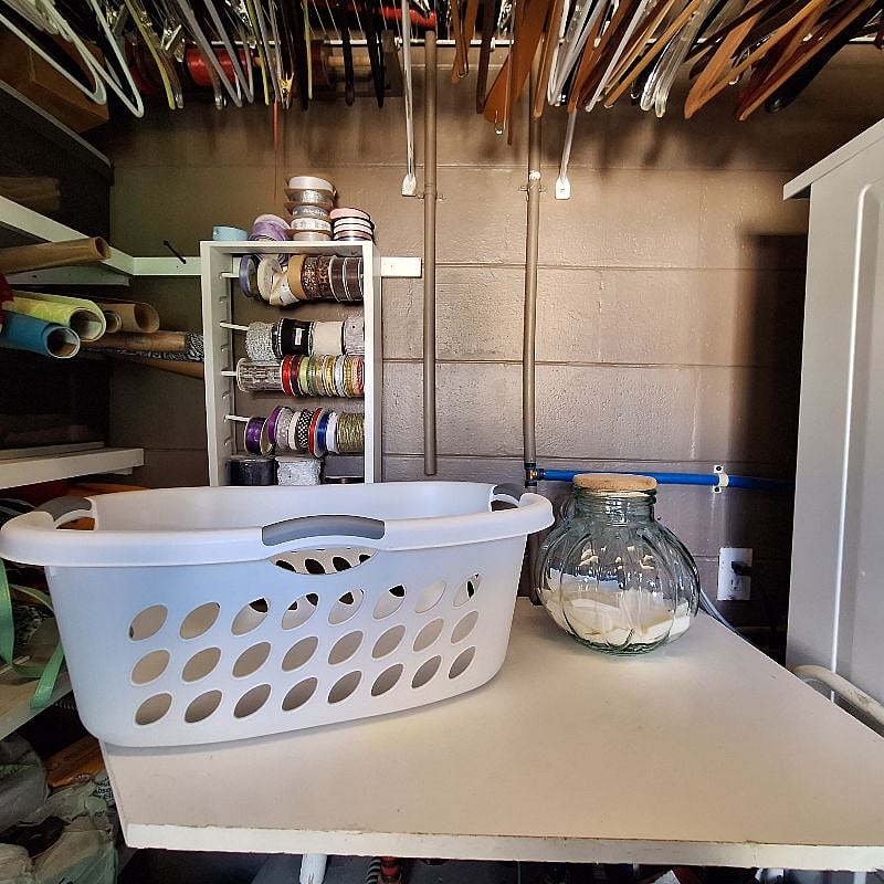 Laundry folding table and laundry basket.