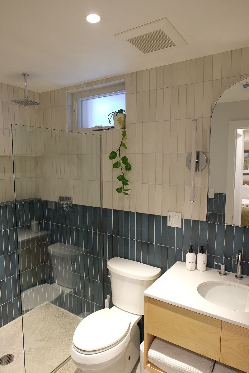 Wide angle of bathroom.