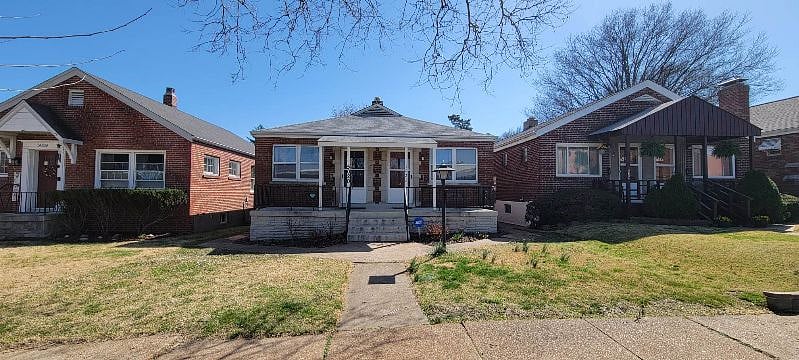 Sturdy brick duplex in a quiet neighborhood.
