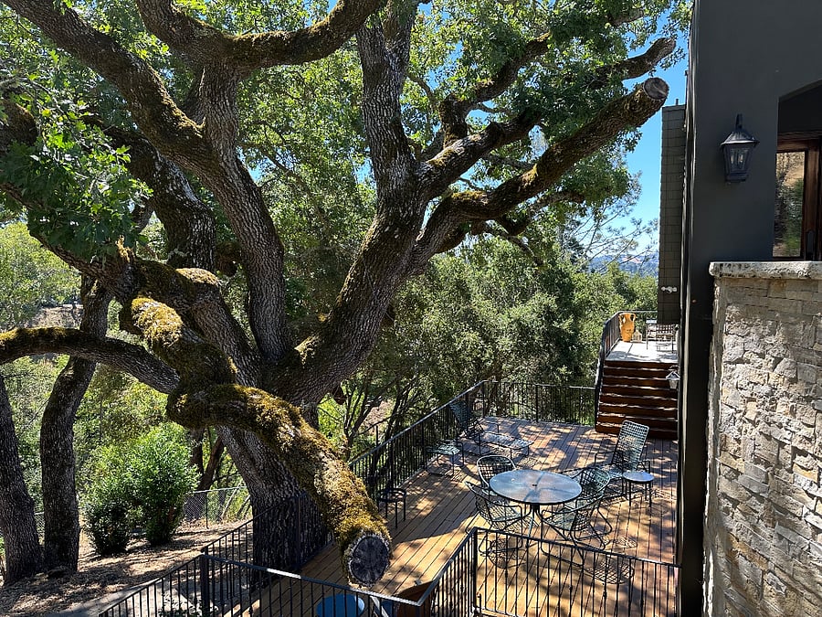 Side deck. Great oak trees keep the deck shady in the summer.