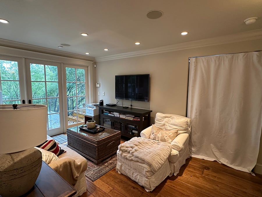 Den has double sound, privacy, and light barrier curtain from main parts of house. Two tenant bedrooms access this den and doors to outside deck and exit/entry..