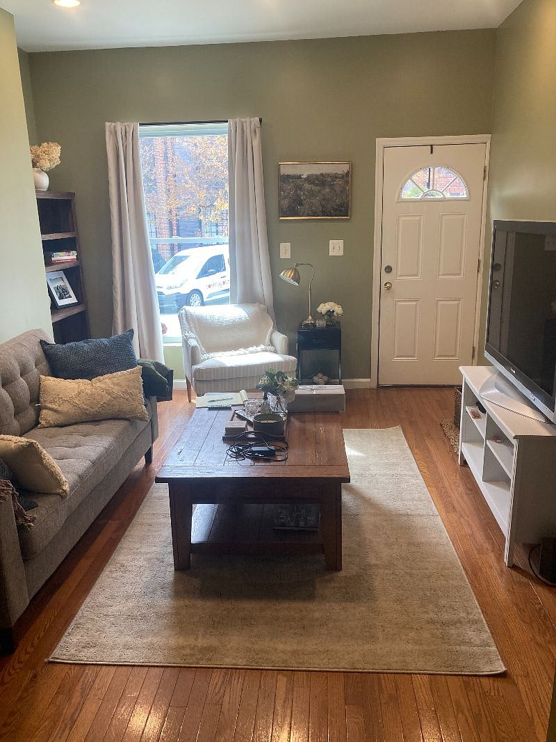 Comfortable entertainment area with large TV. Already set up with Netflix, Prime Video, Disney, HBO Max, Peacock, and Hulu.