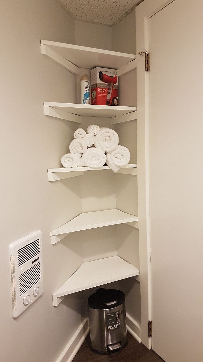 Bathroom stocked with towels, soap, shampoo/conditioner