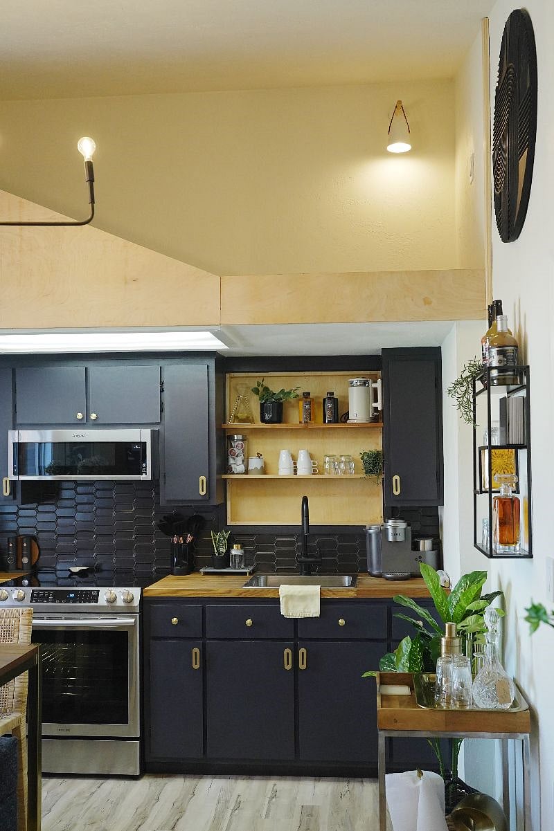 fully stocked kitchen with 5 burner stove, full size oven, microwave, fridge with bottom freezer
