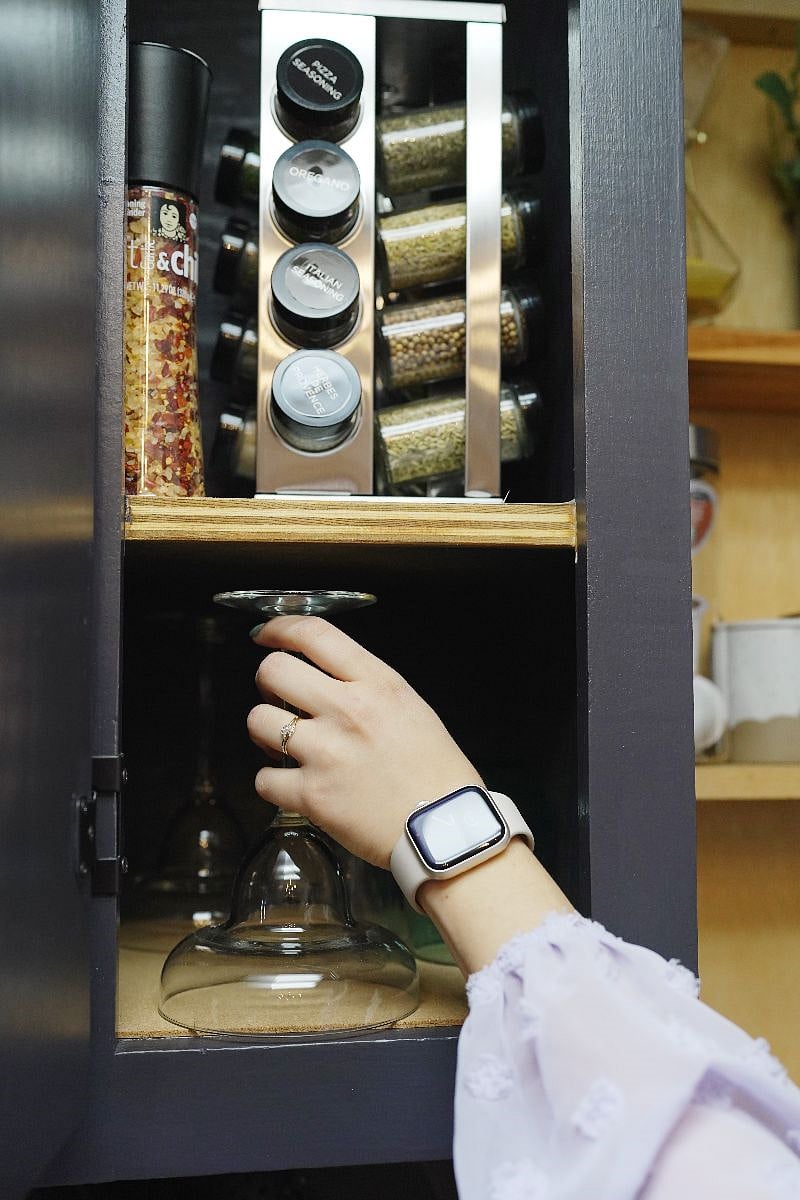 fully stocked kitchen with spices, olive oil and balsamic