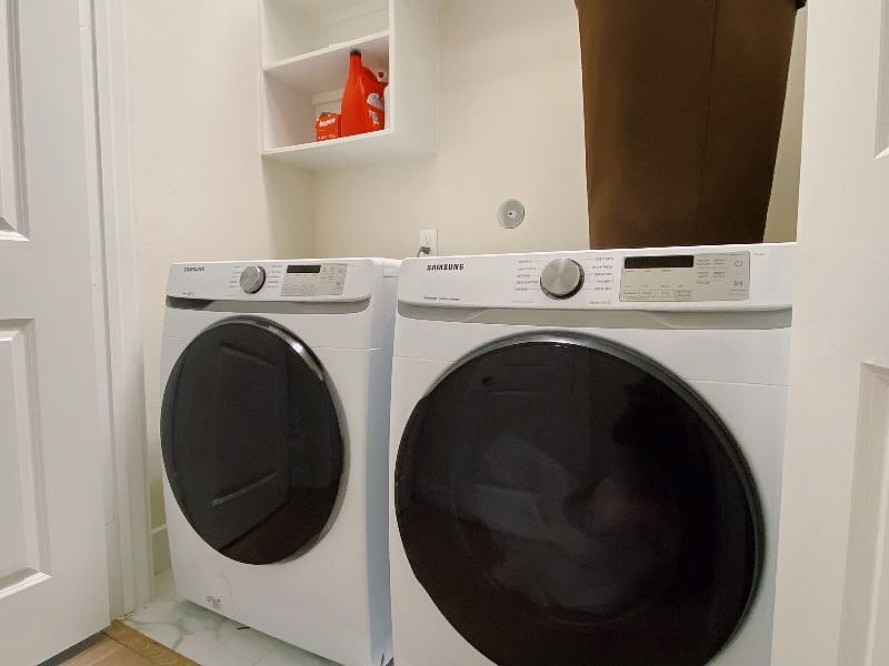 The home includes a washer and dryer unit.