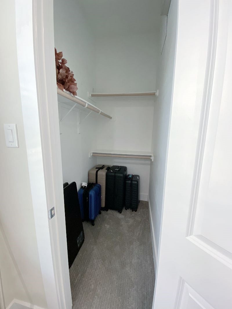 The guest room has a large, walk-in closet that's great for storage.