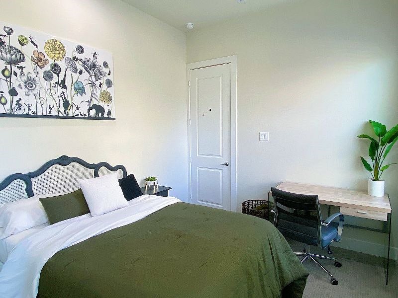 This guest room has also functioned as a study. Let us know which you prefer. Both options shown. 