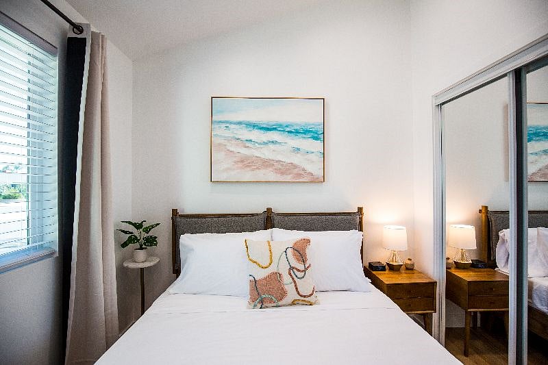 Cozy bedroom with queen memory foam bed and black out curtain