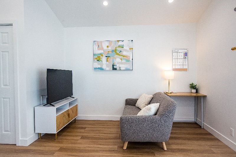 Entertainment space with computer desk