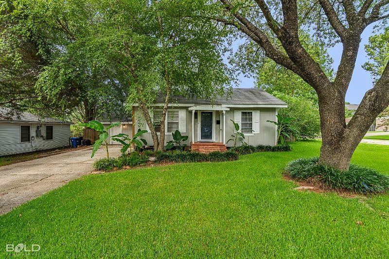 The home's exterior. Guest access is through private entrance at left door of house.