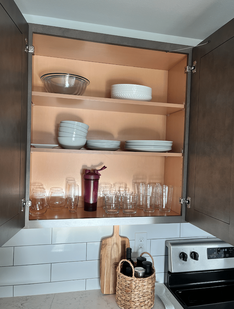 dishes, glasses, flatware, baking dishes, pots, pans, cooking utensils, wine opener