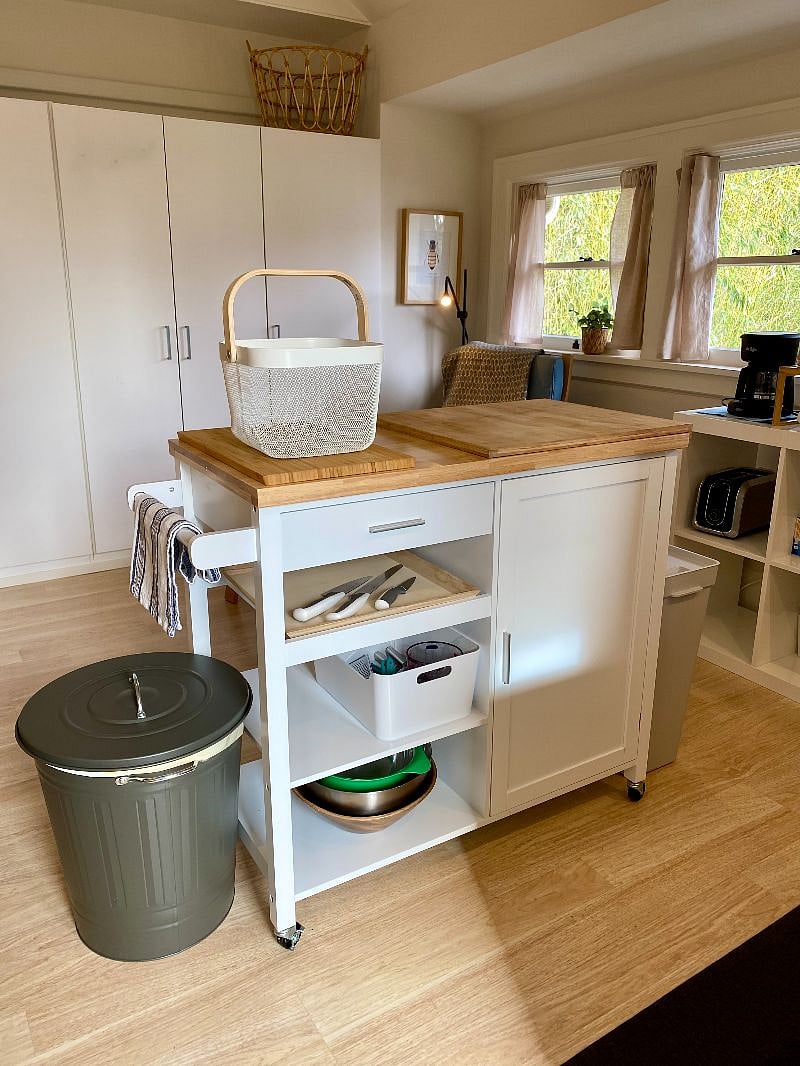 island with pots and pans and storage