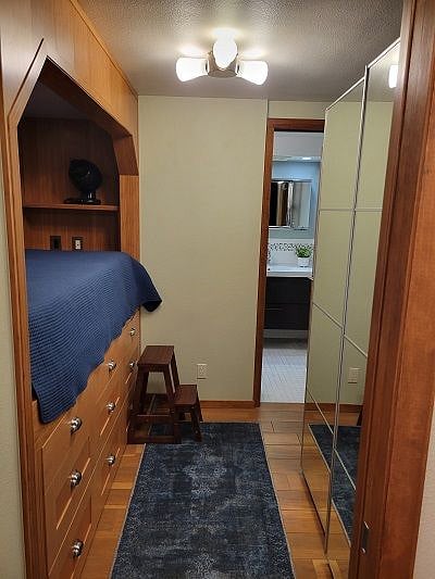 Studio has been converted to allow for privacy for the bedroom area. Pocket door closes off this area.