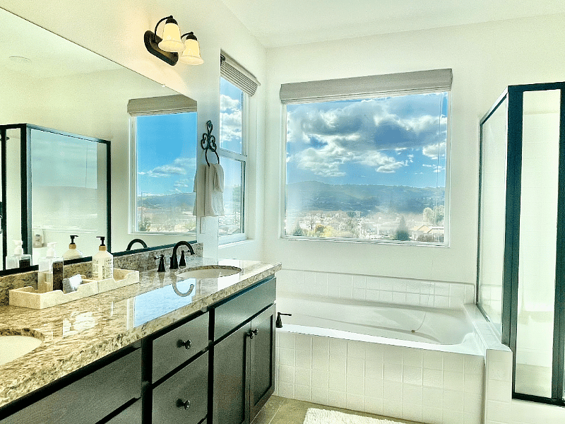 Master bathroom has separate tub and shower.