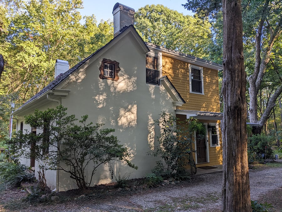 West side shows formal entrance in yellow addition from 1890s