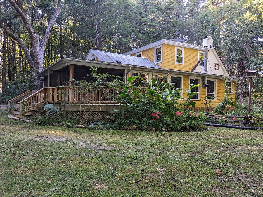 Rear and east side shows screened back porch