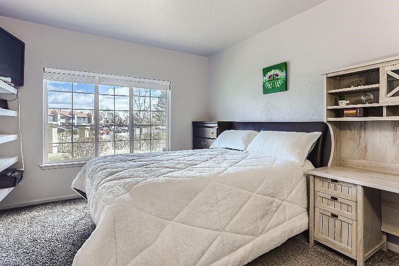 Guest Bedroom with TV, Desk, and Monitors included