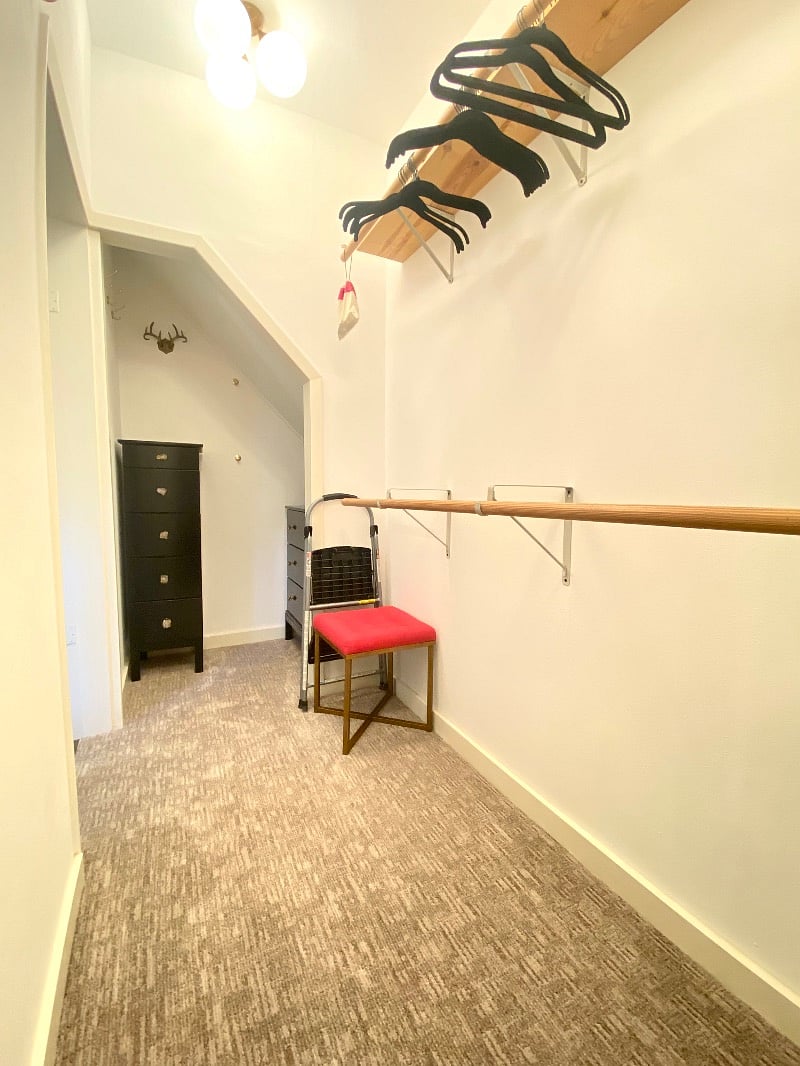 Other view of the primary walk-in closet.