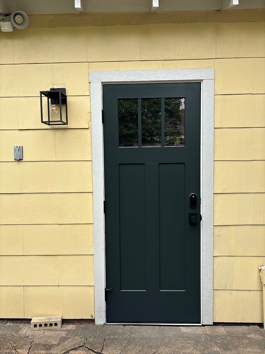 New pedestrian door added in April 2025 with key pad entry