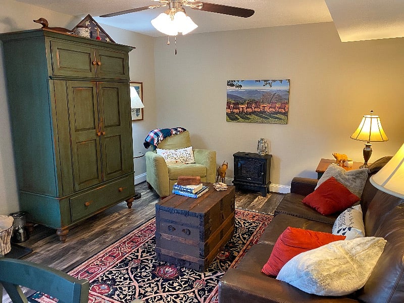 Cozy and inviting great room with Smart TV inside armoire. Electric fireplace for extra warmth on chilly evenings.