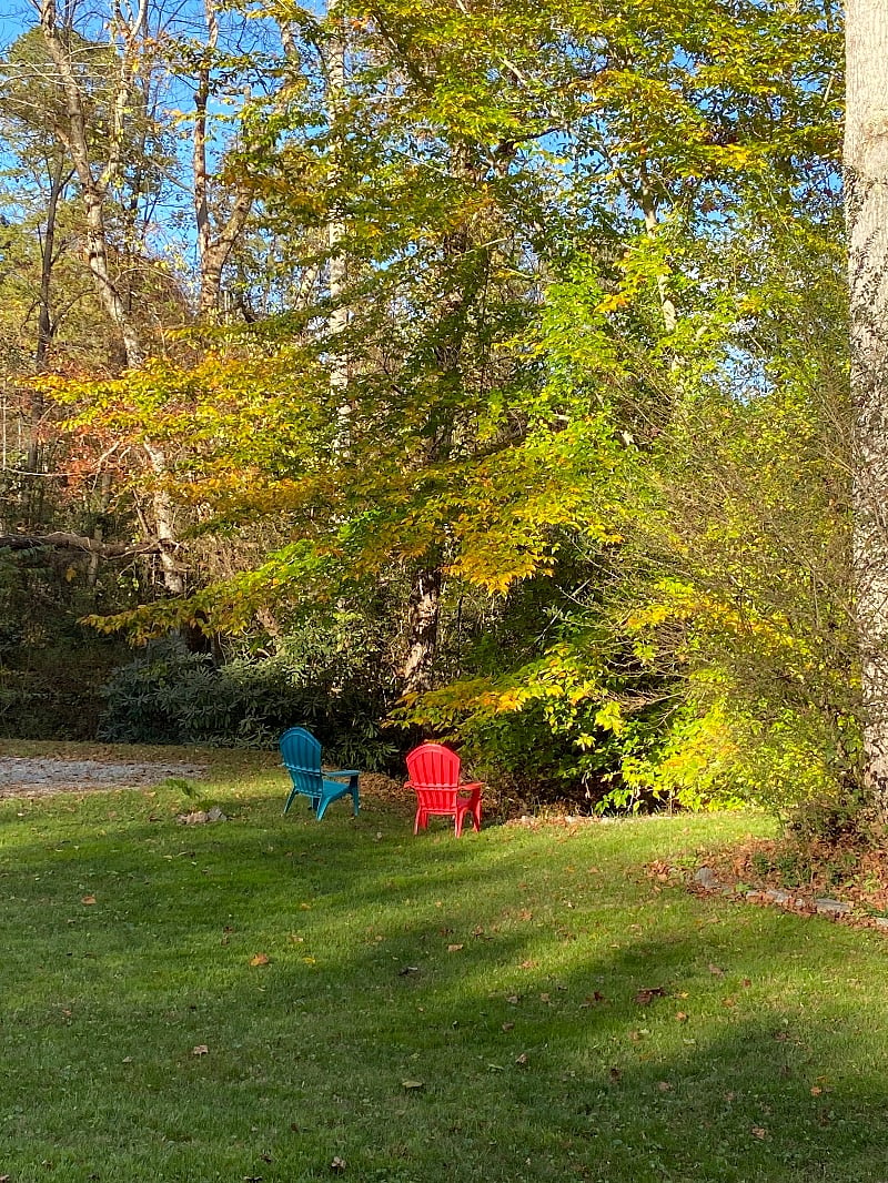 Sit by the creek in Adirondack chairs and relax
