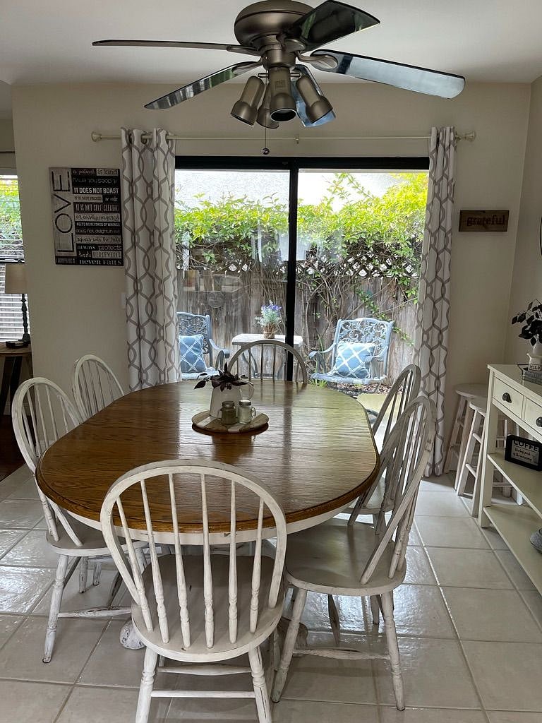 The dining area.A view of the living room complete with a gas fireplace.