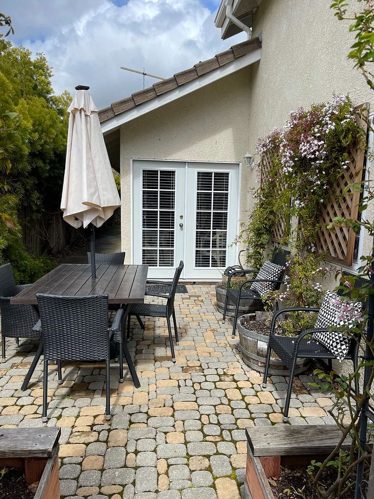 The family room leads out to this outdoor patio, perfect a meal al fresco.
