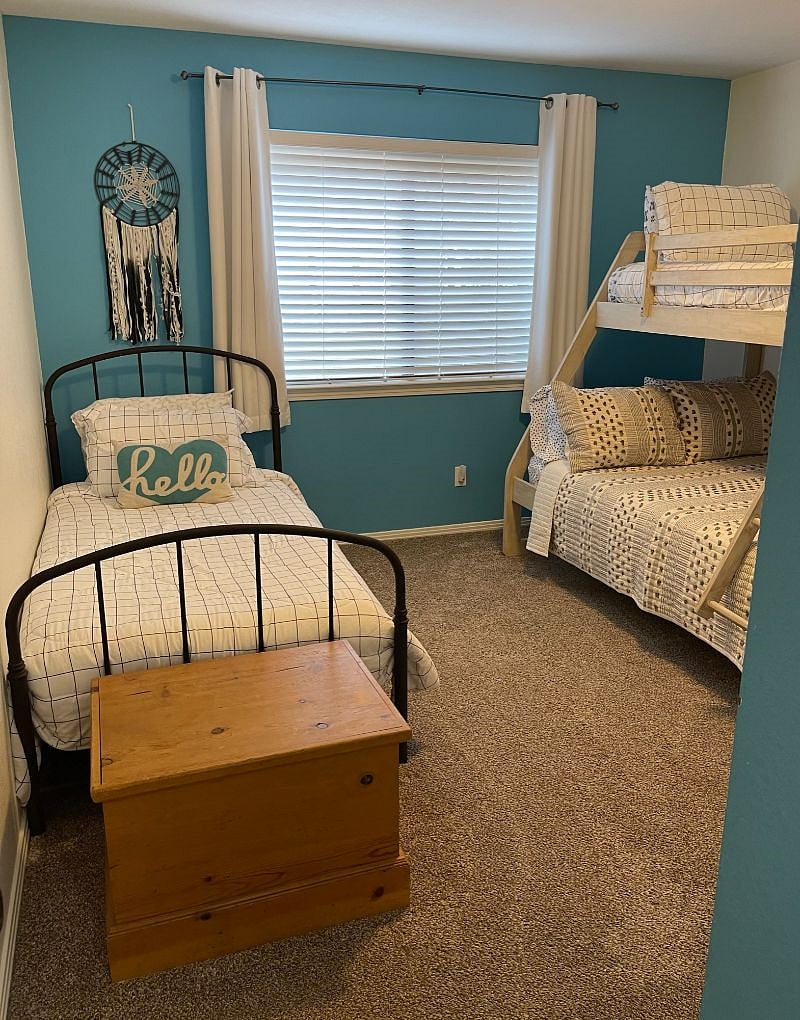 Our "Hello" bedroom is perfect for kids, complete with games in the closet.